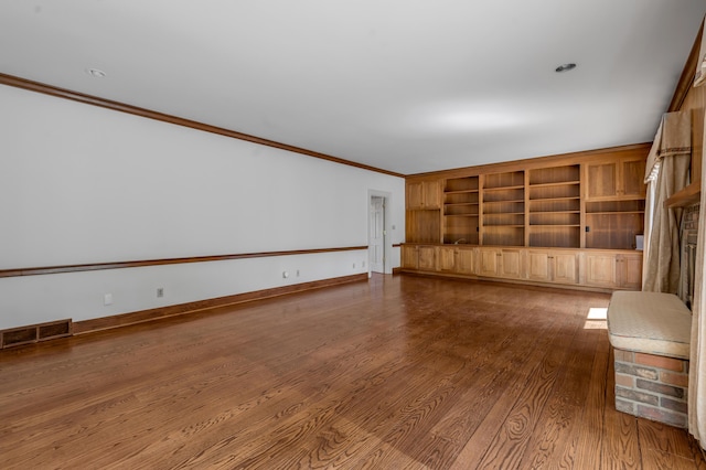 1373 Delong Cir, Lexington, KY 40515 - unfurnished living room featuring crown molding, dark wood finished floors, and baseboards
