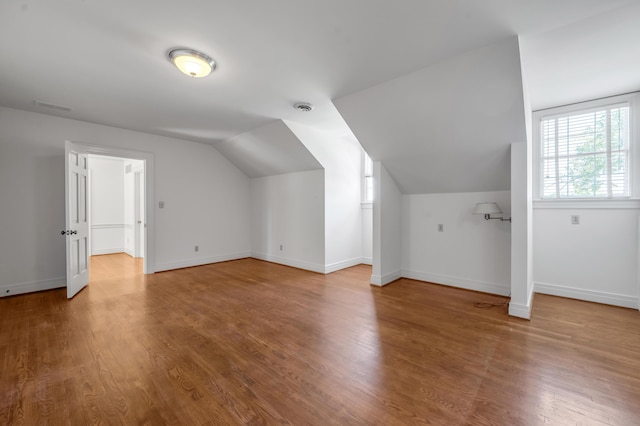 1373 Delong Cir, Lexington, KY 40515 - bonus room featuring wood finished floors, vaulted ceiling, and baseboards
