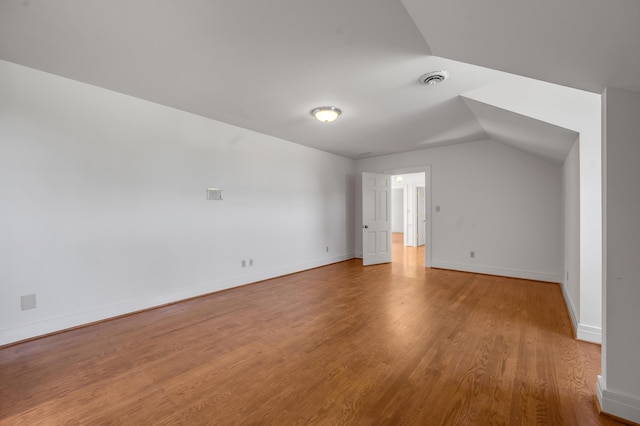 1373 Delong Cir, Lexington, KY 40515 - bonus room with wood finished floors, vaulted ceiling, and baseboards