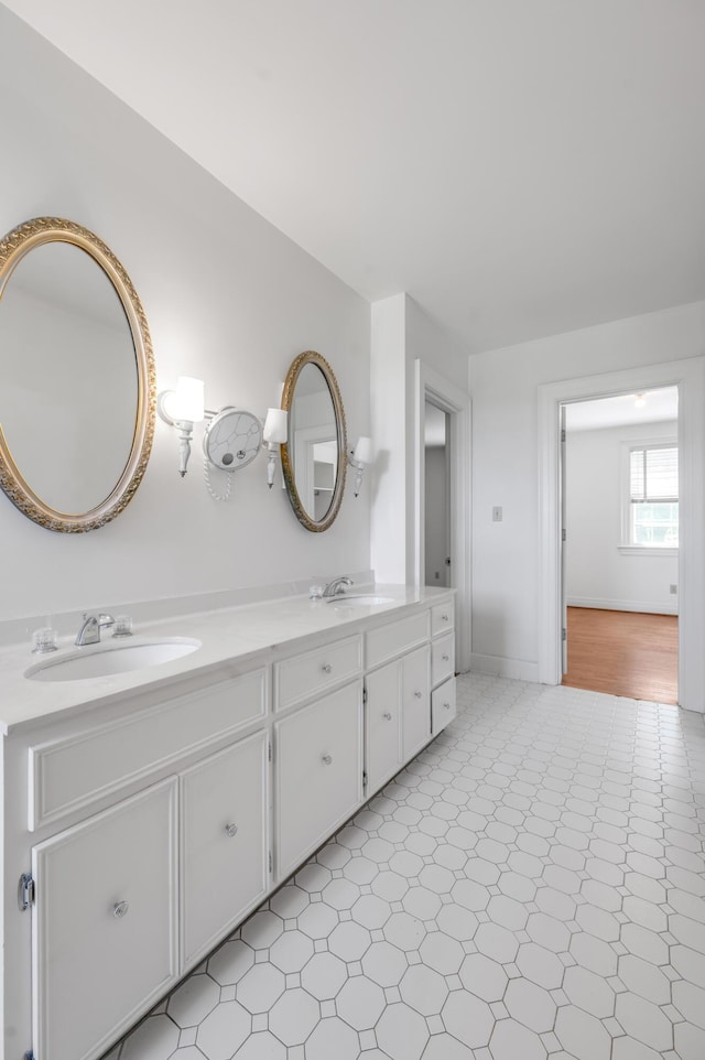 1373 Delong Cir, Lexington, KY 40515 - full bath with tile patterned floors, double vanity, and baseboards
