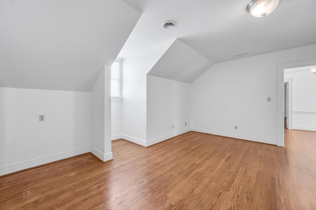 1373 Delong Cir, Lexington, KY 40515 - bonus room with vaulted ceiling, wood finished floors, and baseboards