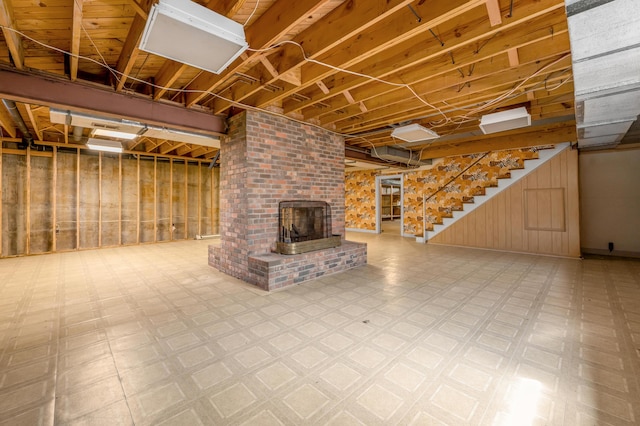 1373 Delong Cir, Lexington, KY 40515 - below grade area with tile patterned floors, stairs, and a fireplace
