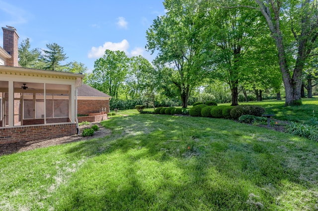 1373 Delong Cir, Lexington, KY 40515 - view of grassy yard featuring ceiling fan and a sunroom