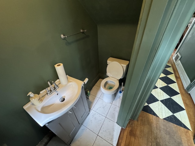 808 Windsor Ct, Ashland, KY 41101 - half bathroom featuring toilet and a sink