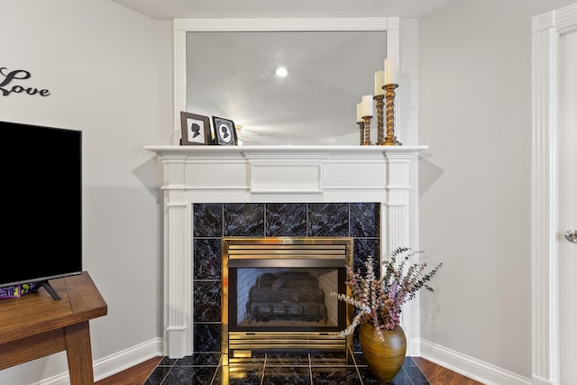 256 Park Lakes Dr, Richmond, KY 40475 - detailed view of baseboards and a tile fireplace
