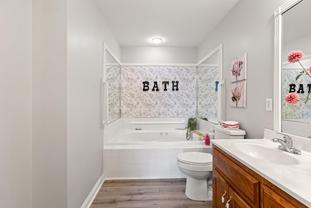 256 Park Lakes Dr, Richmond, KY 40475 - full bathroom featuring wood finished floors, toilet, a garden tub, and vanity