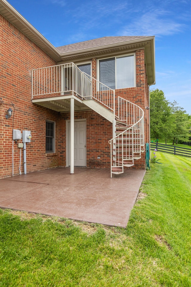 256 Park Lakes Dr, Richmond, KY 40475 - back of property with a patio, brick siding, and stairway