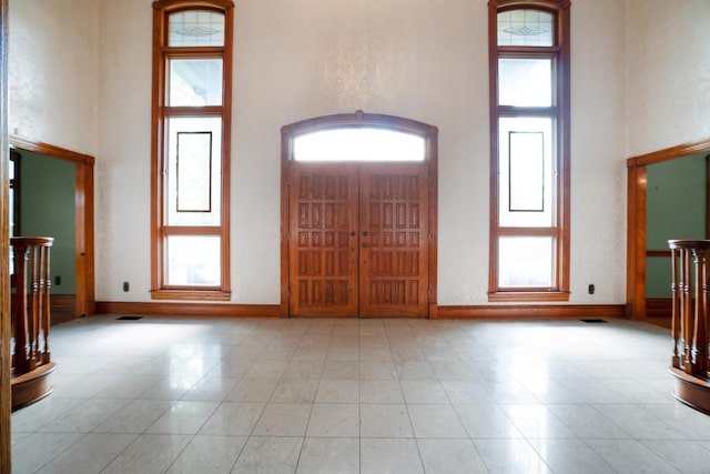 319 Fifth St, Paintsville, KY 41240 - entryway with a high ceiling, plenty of natural light, and baseboards