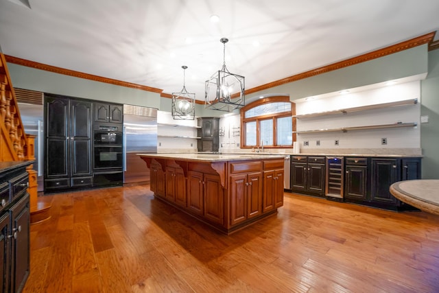 319 Fifth St, Paintsville, KY 41240 - kitchen featuring open shelves, stainless steel appliances, beverage cooler, crown molding, and a chandelier