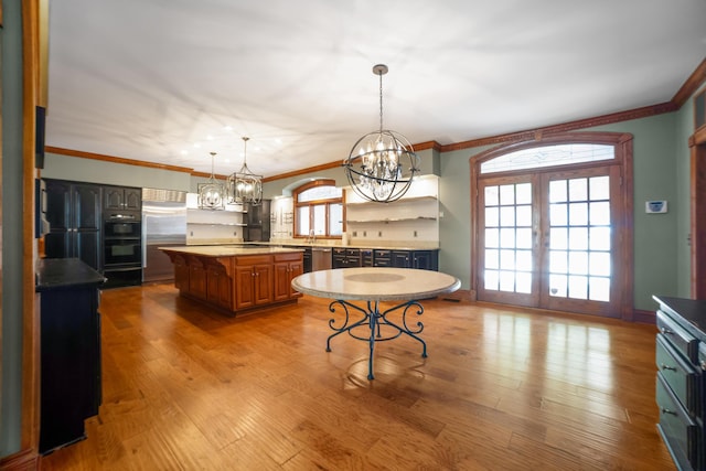 319 Fifth St, Paintsville, KY 41240 - kitchen with a chandelier, french doors, high end refrigerator, wood finished floors, and ornamental molding