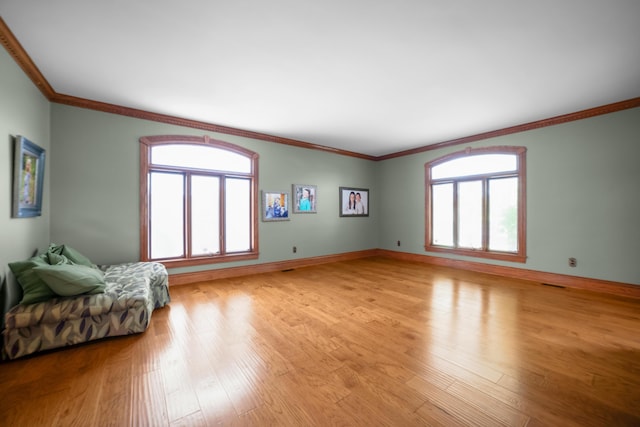 319 Fifth St, Paintsville, KY 41240 - living area featuring light wood finished floors, crown molding, and baseboards