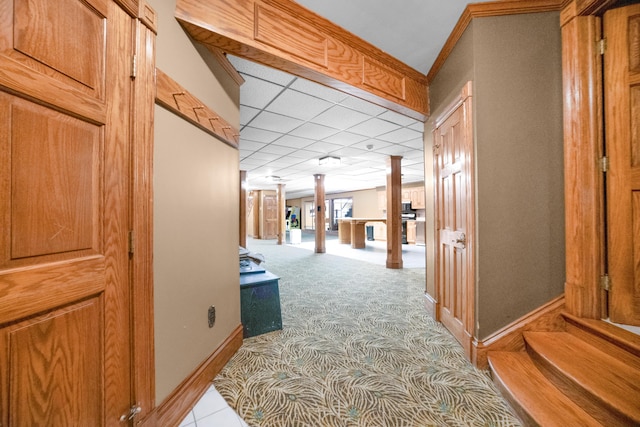 319 Fifth St, Paintsville, KY 41240 - hall with decorative columns, light colored carpet, a drop ceiling, and baseboards