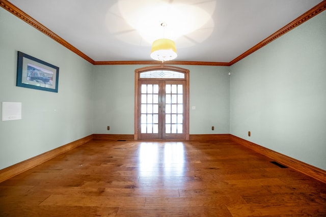 319 Fifth St, Paintsville, KY 41240 - unfurnished room featuring wood finished floors, baseboards, crown molding, and french doors