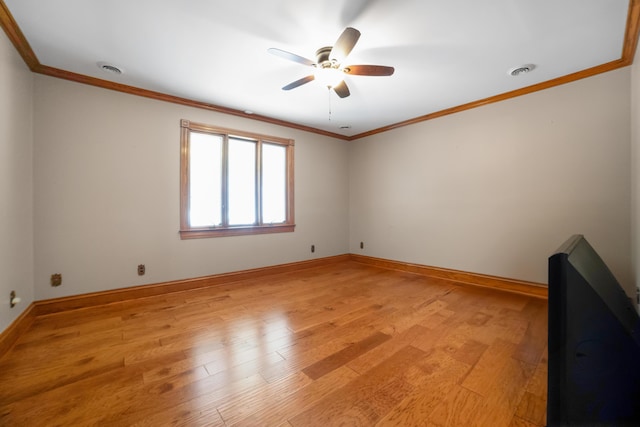 319 Fifth St, Paintsville, KY 41240 - empty room with ornamental molding, a ceiling fan, light wood-style floors, and baseboards