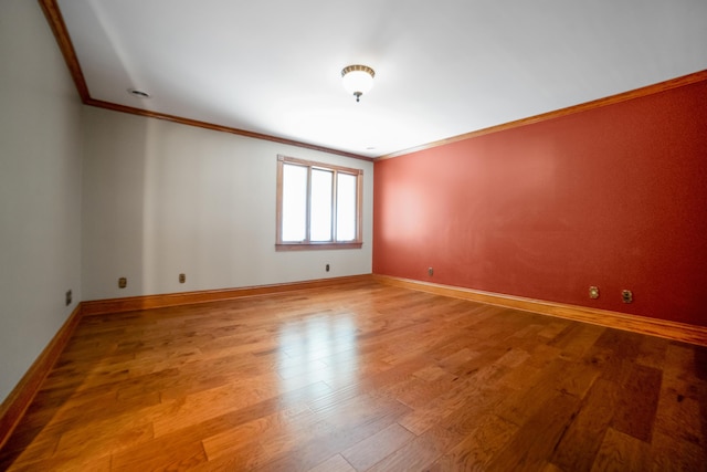 319 Fifth St, Paintsville, KY 41240 - empty room featuring crown molding, light wood finished floors, and baseboards