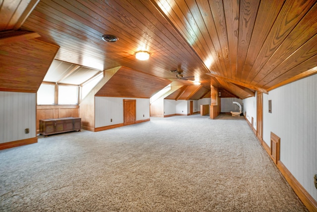 319 Fifth St, Paintsville, KY 41240 - bonus room with wood ceiling, lofted ceiling, carpet flooring, wood walls, and baseboards