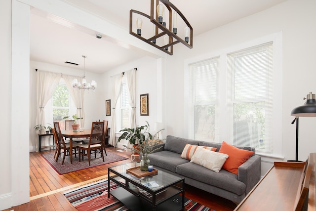 647 N Limestone, Lexington, KY 40508 - living room featuring a chandelier and wood-type flooring