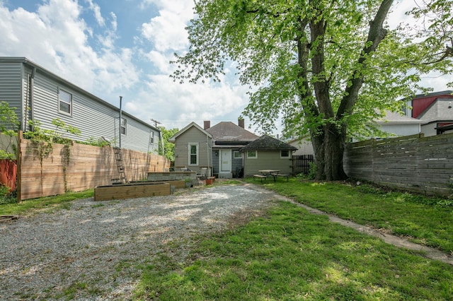 647 N Limestone, Lexington, KY 40508 - rear view of property featuring a garden