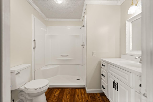 3131 Lily Rd, London, KY 40744 - bathroom with wood finished floors, a textured ceiling, a shower, ornamental molding, and vanity