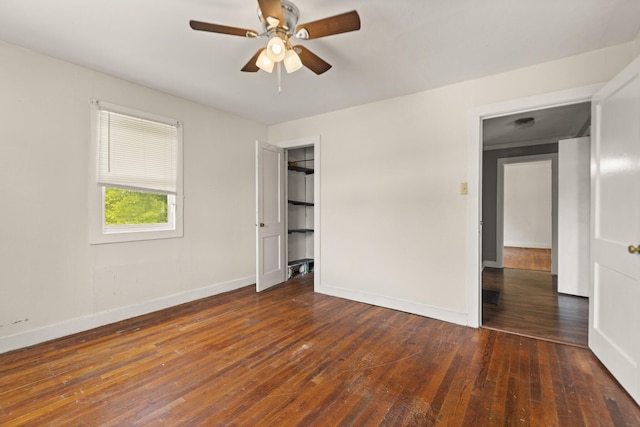 3131 Lily Rd, London, KY 40744 - unfurnished bedroom with wood-type flooring, baseboards, and a ceiling fan