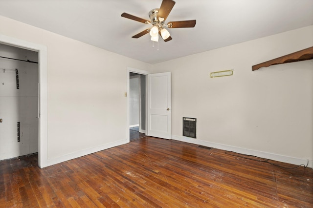 3131 Lily Rd, London, KY 40744 - unfurnished living room featuring a ceiling fan, hardwood / wood-style floors, and baseboards