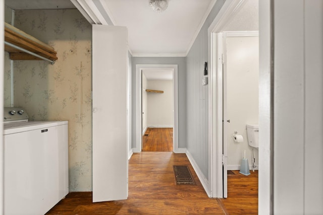 3131 Lily Rd, London, KY 40744 - laundry room with washer / clothes dryer, dark wood-style flooring, ornamental molding, and wallpapered walls