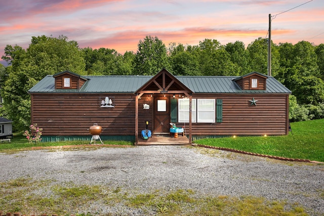 266 Boaters Aly, Nancy, KY 42544 - chalet / cabin featuring metal roof, log veneer siding, and a front yard