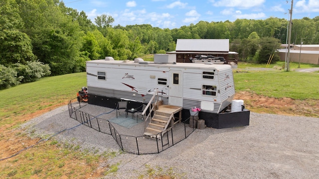 266 Boaters Aly, Nancy, KY 42544 - rear view of property featuring a lawn and a wooded view