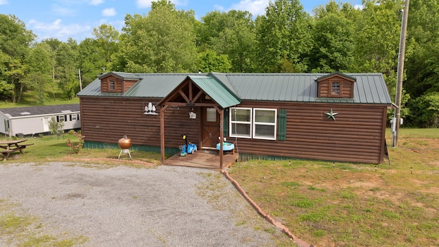 266 Boaters Aly, Nancy, KY 42544 - view of front of house with metal roof and log veneer siding
