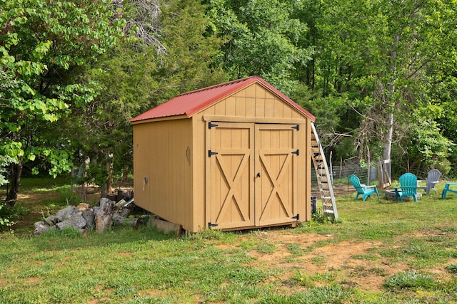 266 Boaters Aly, Nancy, KY 42544 - view of shed with a fire pit