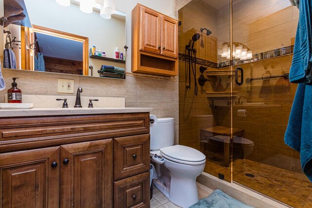 1220 Fox Wood Rd, Frankfort, KY 40601 - bathroom with toilet, a shower stall, vanity, and tile walls