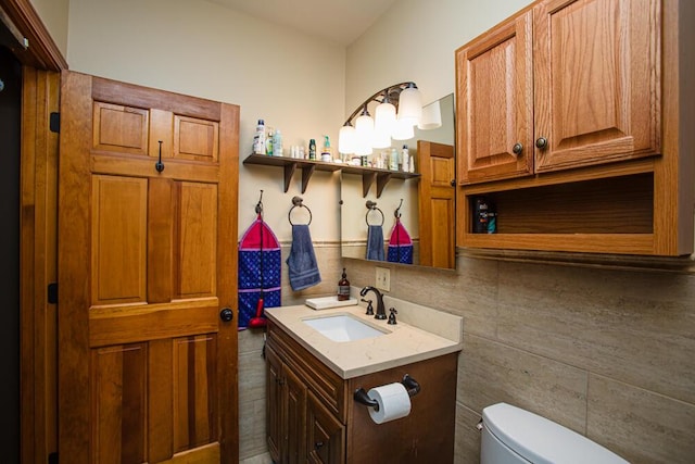 1220 Fox Wood Rd, Frankfort, KY 40601 - half bath with toilet, vanity, and tile walls