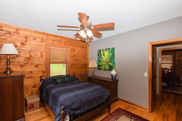 1220 Fox Wood Rd, Frankfort, KY 40601 - bedroom with wood walls, wood finished floors, and ceiling fan
