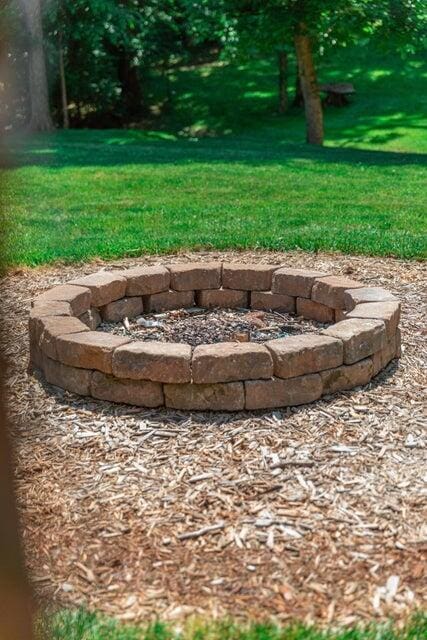 1220 Fox Wood Rd, Frankfort, KY 40601 - view of grassy yard with a fire pit