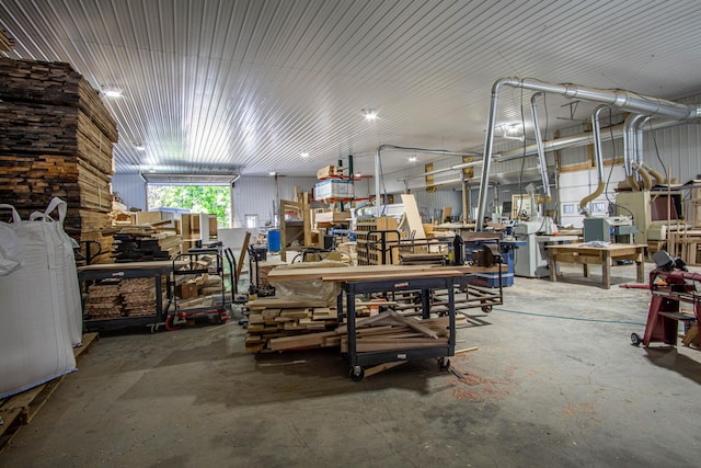 227 Callihan Rd, East Bernstadt, KY 40729 - misc room featuring a workshop area and unfinished concrete flooring