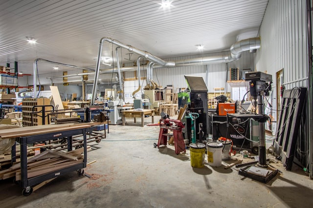 227 Callihan Rd, East Bernstadt, KY 40729 - misc room featuring a workshop area and unfinished concrete floors