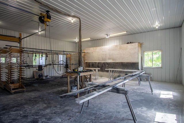 227 Callihan Rd, East Bernstadt, KY 40729 - miscellaneous room featuring metal wall and concrete floors