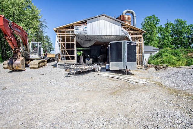 227 Callihan Rd, East Bernstadt, KY 40729 - back of property with a sunroom