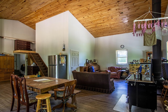 227 Callihan Rd, East Bernstadt, KY 40729 - dining area with wood finished floors, stairs, high vaulted ceiling, and wood ceiling