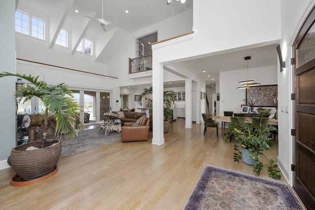 1782 W Leestown Rd, Midway, KY 40347 - living room with a high ceiling, light wood-type flooring, and a ceiling fan