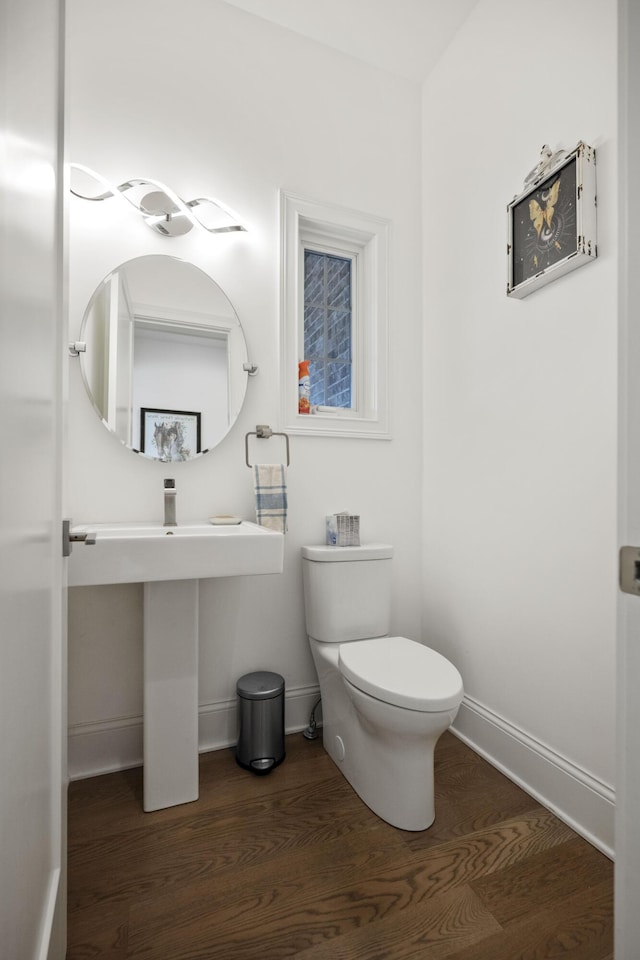 1782 W Leestown Rd, Midway, KY 40347 - half bathroom featuring baseboards, wood finished floors, and toilet