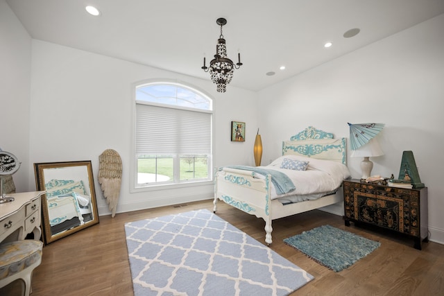 1782 W Leestown Rd, Midway, KY 40347 - bedroom with wood finished floors, a chandelier, baseboards, and recessed lighting