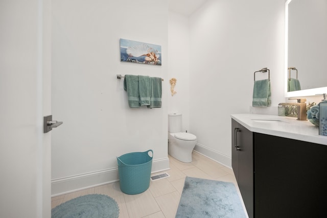 1782 W Leestown Rd, Midway, KY 40347 - bathroom with toilet, vanity, tile patterned flooring, and baseboards