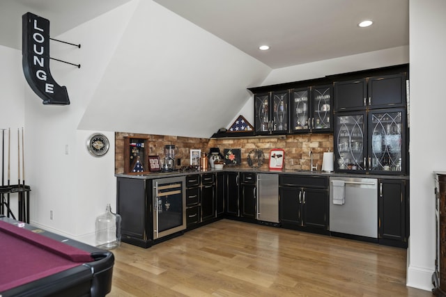 1782 W Leestown Rd, Midway, KY 40347 - indoor wet bar with stainless steel dishwasher, beverage cooler, light wood-style flooring, vaulted ceiling, and tasteful backsplash