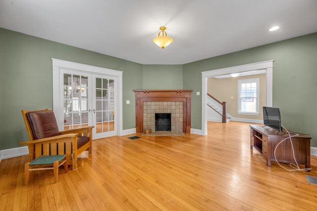 133 Victory Ave, Lexington, KY 40502 - living area featuring french doors, stairs, light wood-style floors, baseboards, and recessed lighting