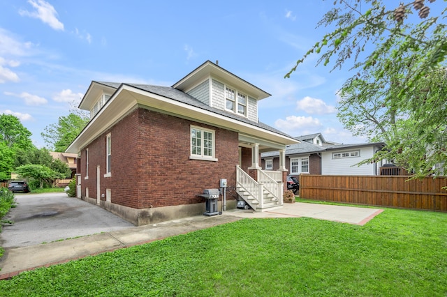 133 Victory Ave, Lexington, KY 40502 - back of property featuring brick siding and a patio