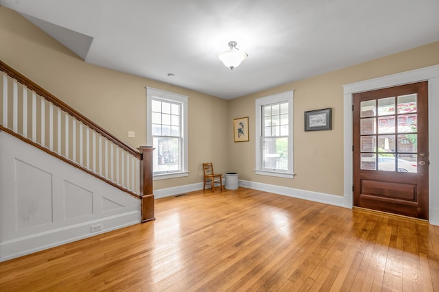 133 Victory Ave, Lexington, KY 40502 - entryway with stairway, light wood-type flooring, plenty of natural light, and baseboards