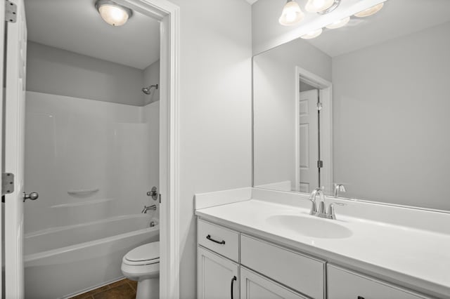 full bathroom with toilet, vanity, shower / bath combination, and tile patterned floors