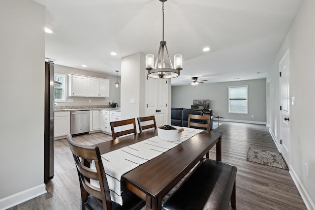 140 Peaceful Lndg, Georgetown, KY 40324 - dining area with a ceiling fan, a chandelier, dark wood finished floors, baseboards, and recessed lighting