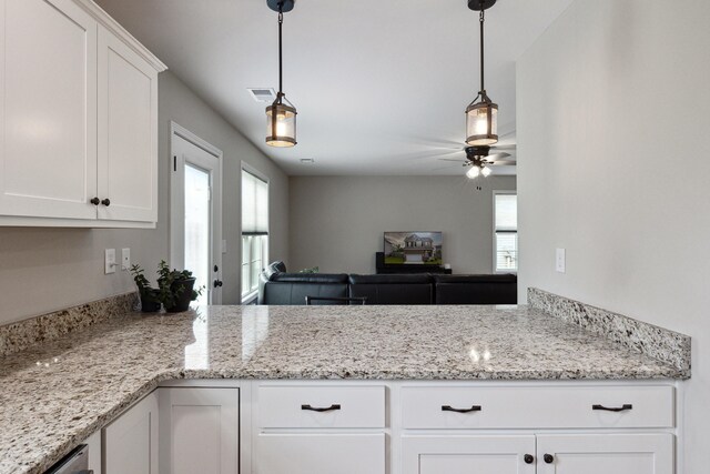 140 Peaceful Lndg, Georgetown, KY 40324 - kitchen featuring ceiling fan, white cabinets, decorative light fixtures, and light stone countertops